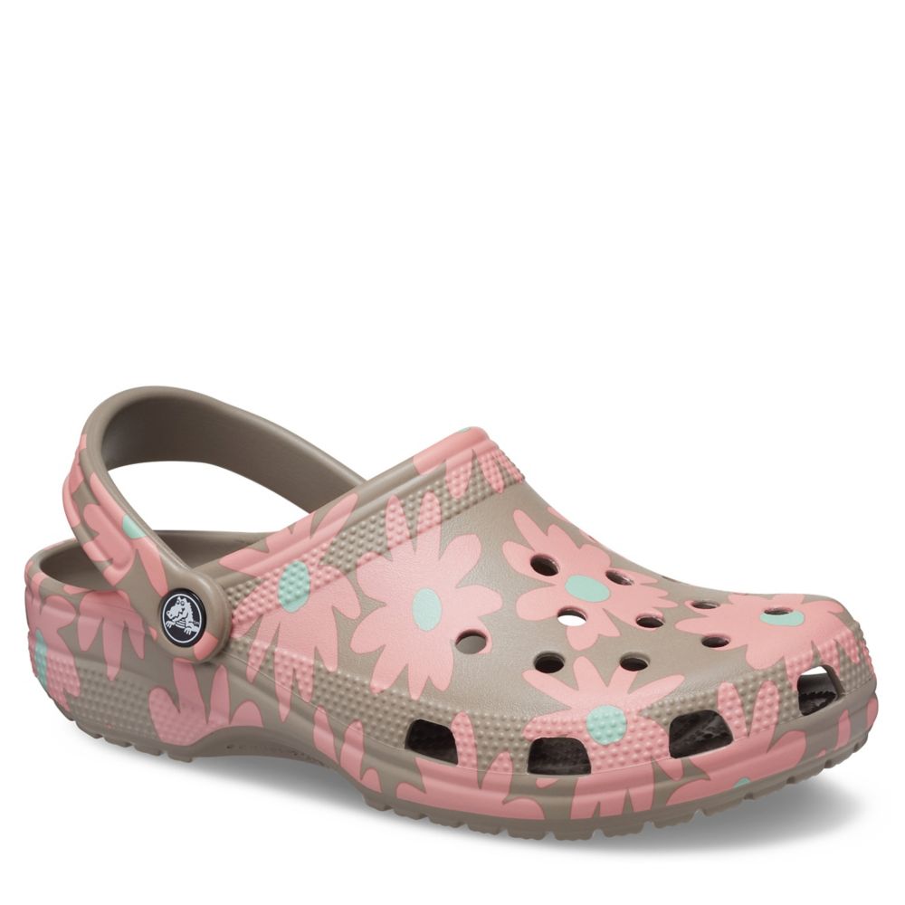 Pink crocs with flowers hot sale