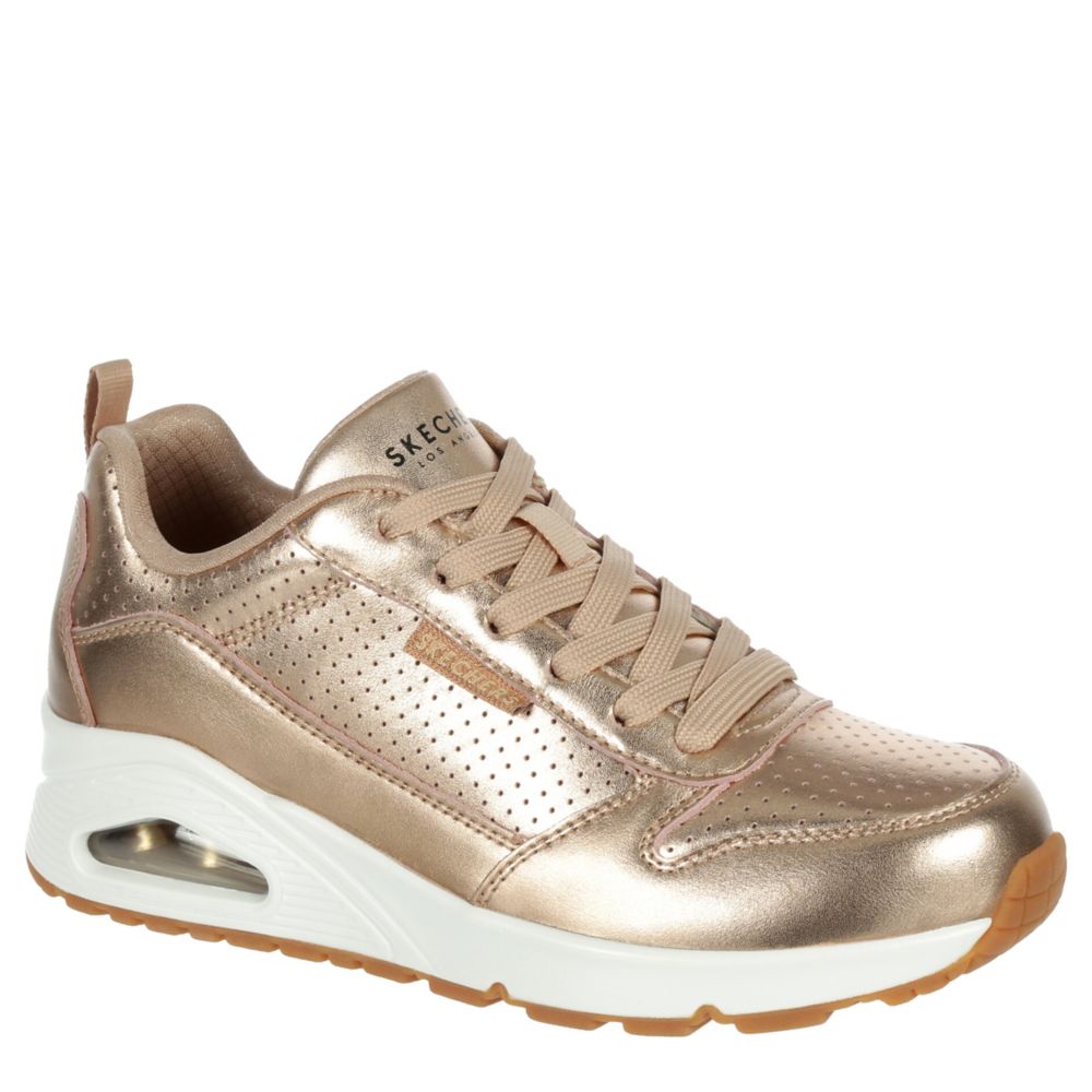 Skechers store gold sneakers