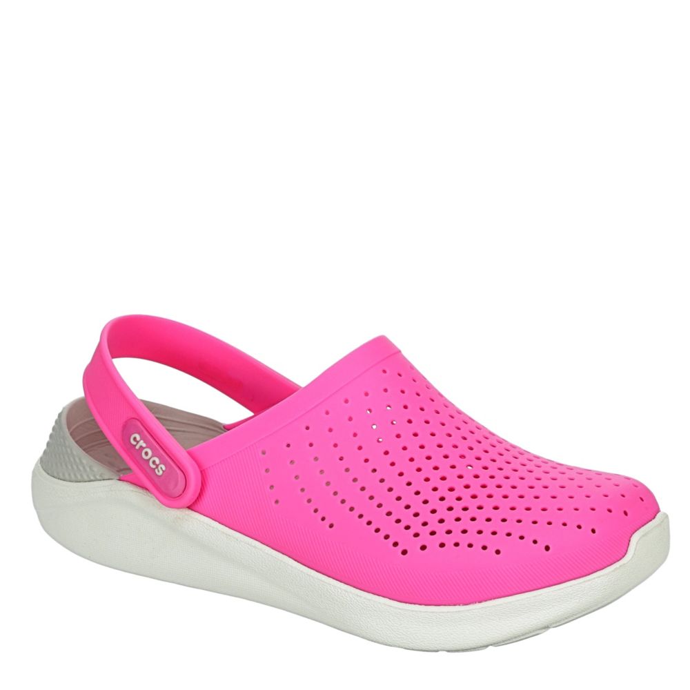 pink crocs with white fur