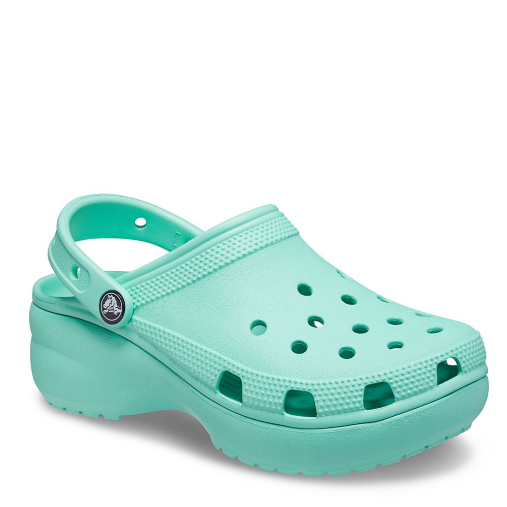 green platform crocs