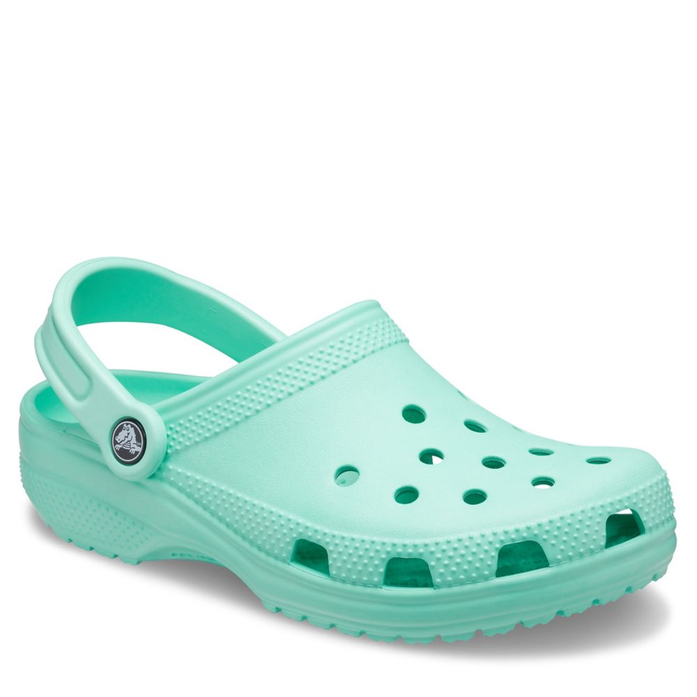 mint green crocs