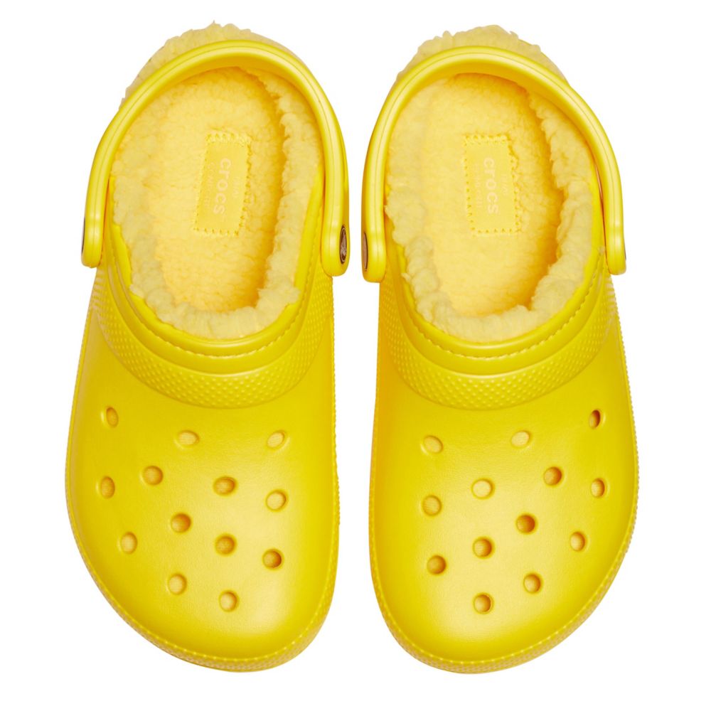 white and yellow crocs