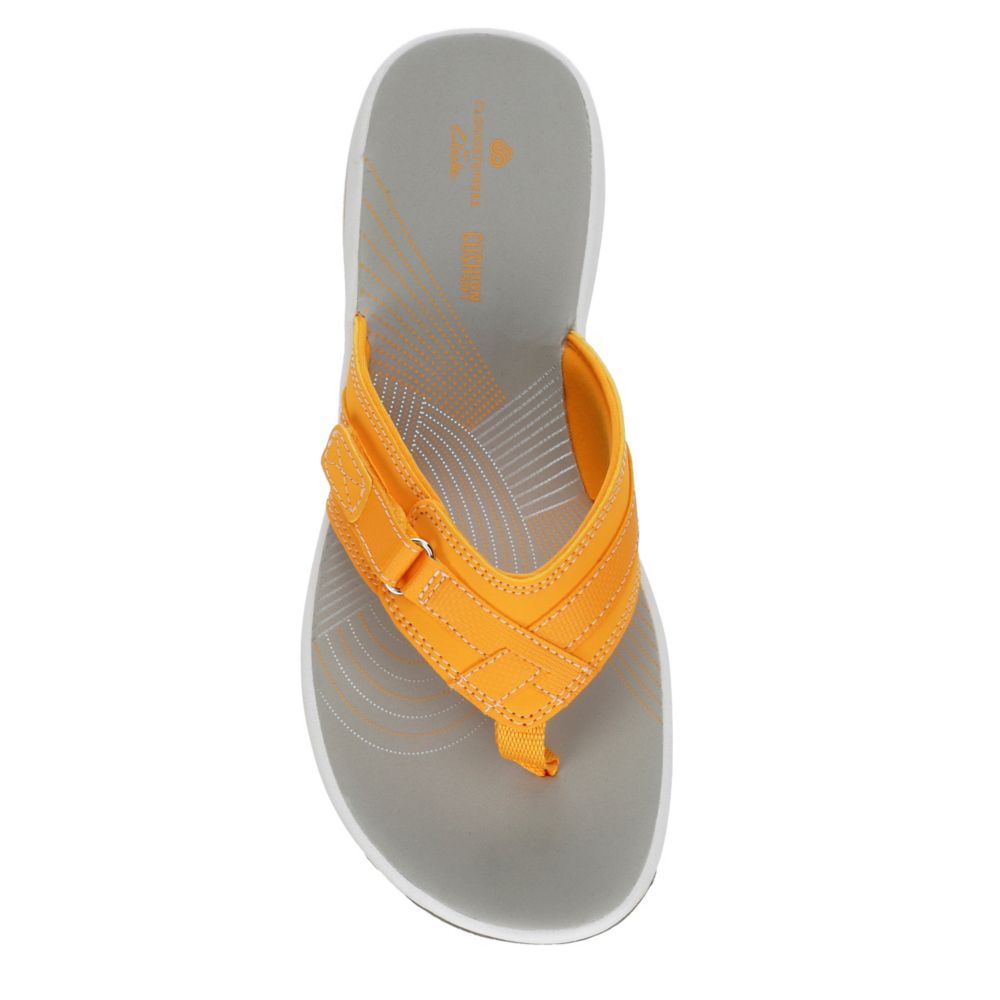yellow clarks flip flops