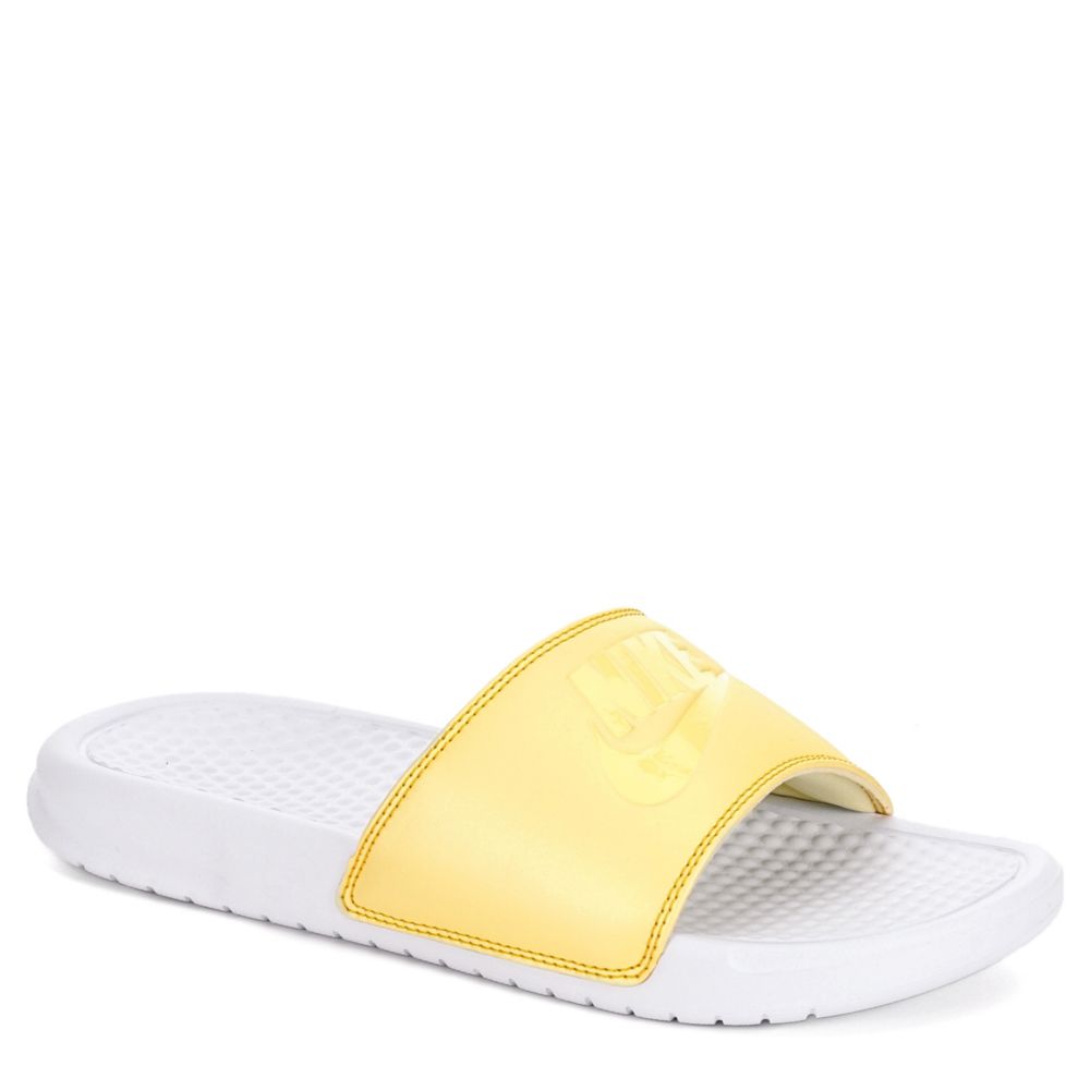 yellow and black nike slides