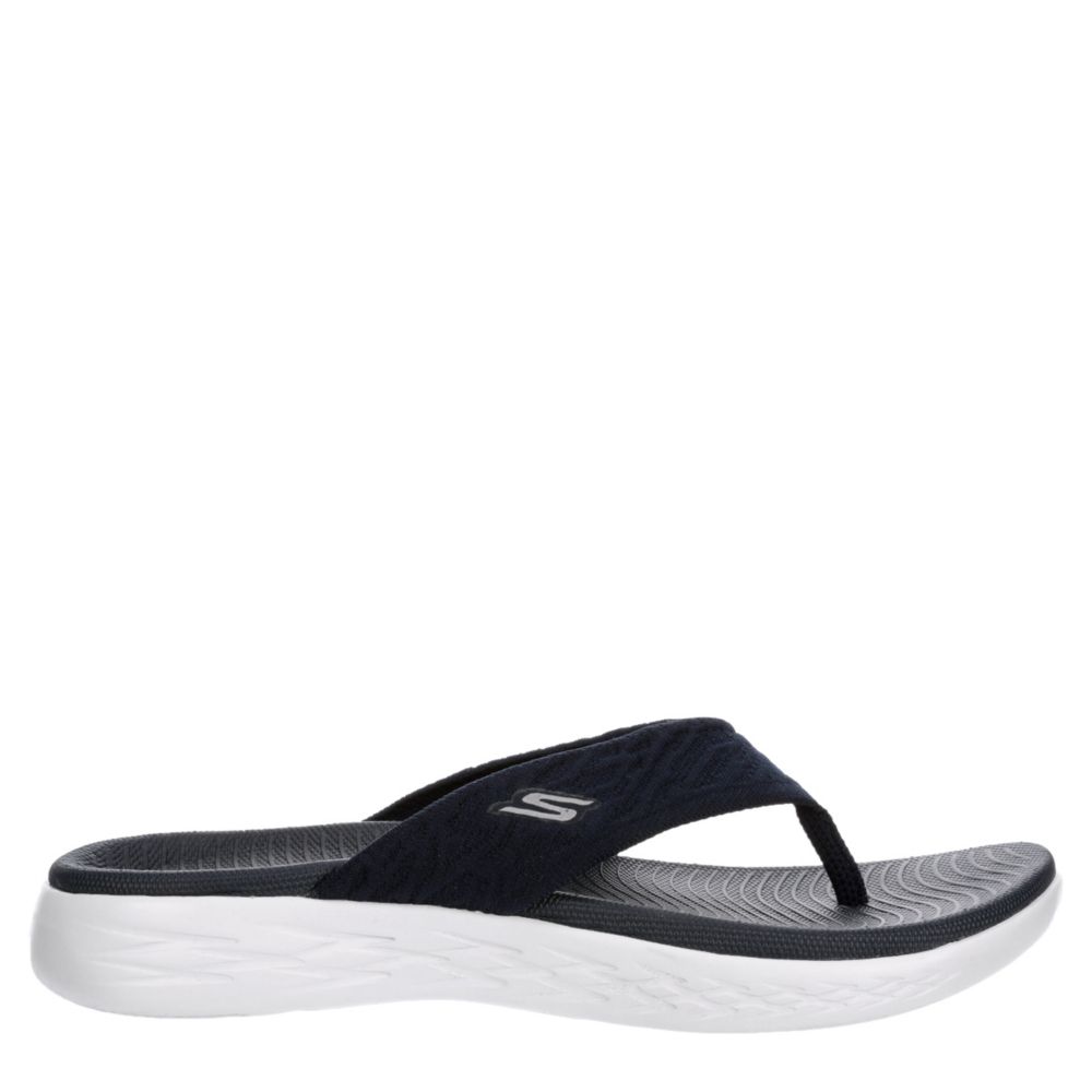 navy skechers flip flops
