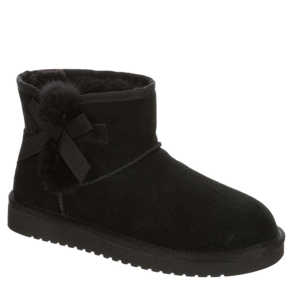 black and white fur boots