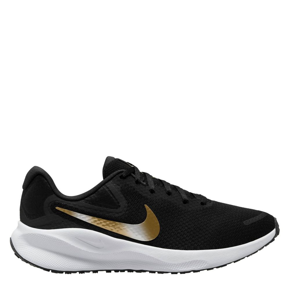 Women's nike black store and gold shoes