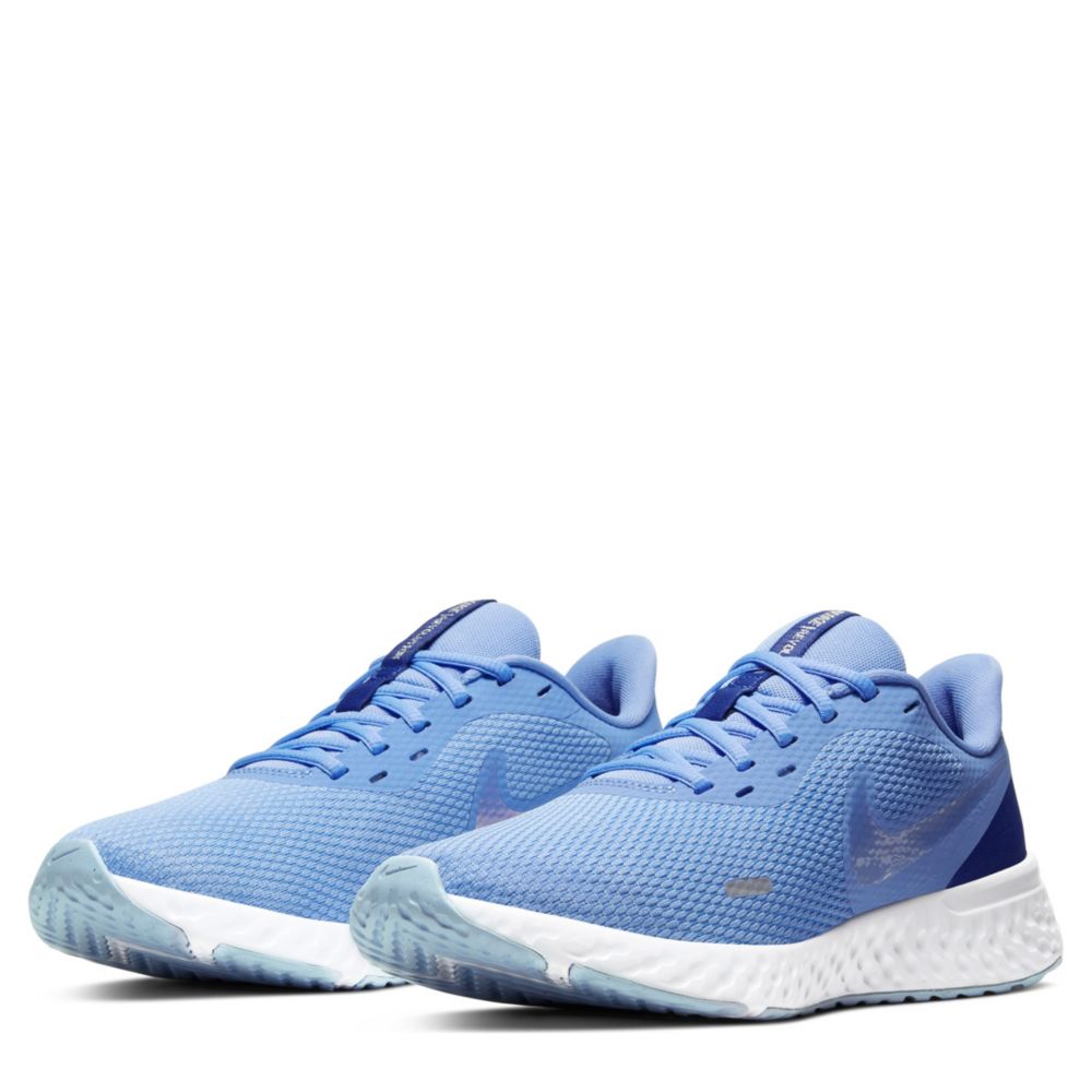 blue and white nike running shoes