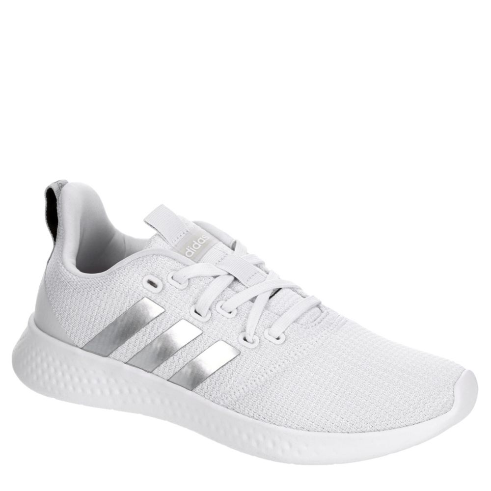 white athletic sneakers