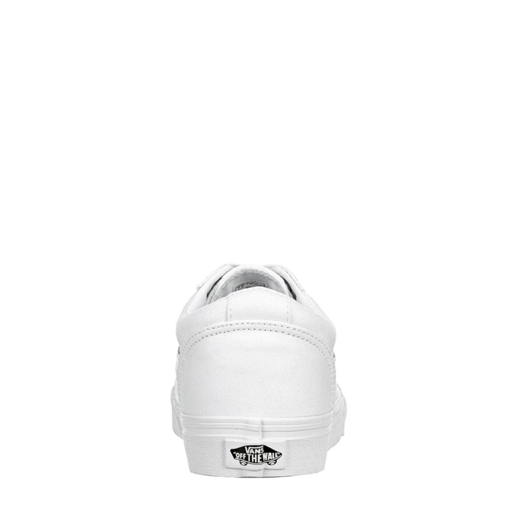 White vans slip ons rack store room shoes