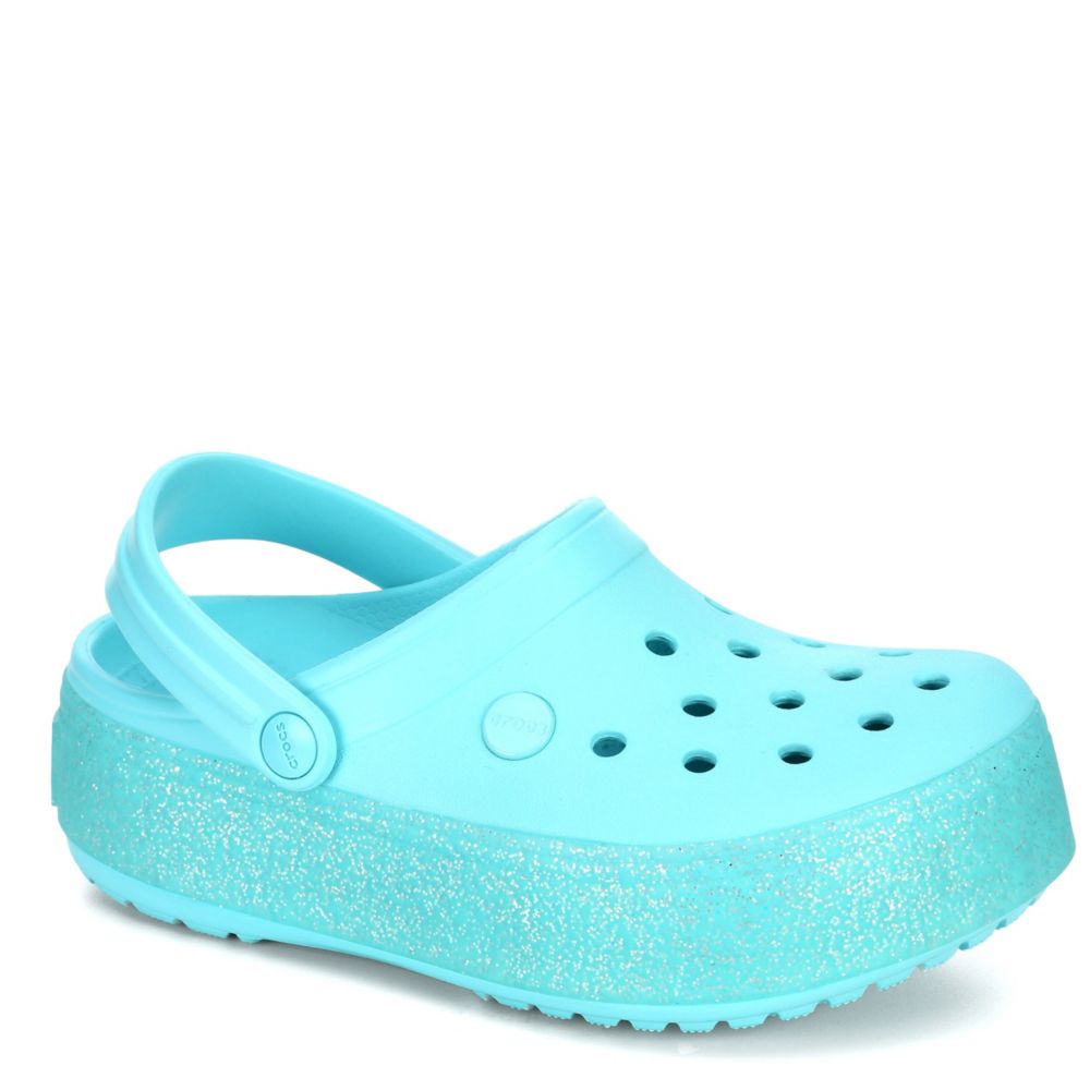 teal crocs with fur