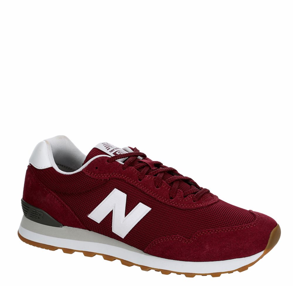 maroon and white tennis shoes