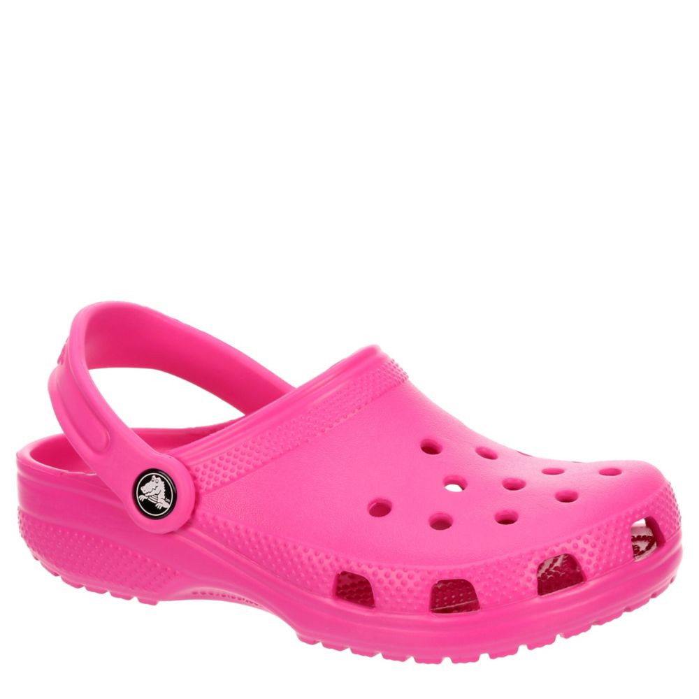 pink crocs with