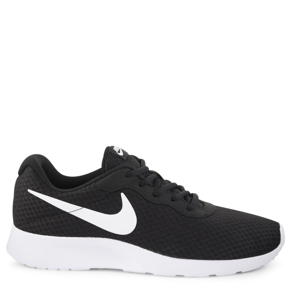 white nike tanjun sneakers