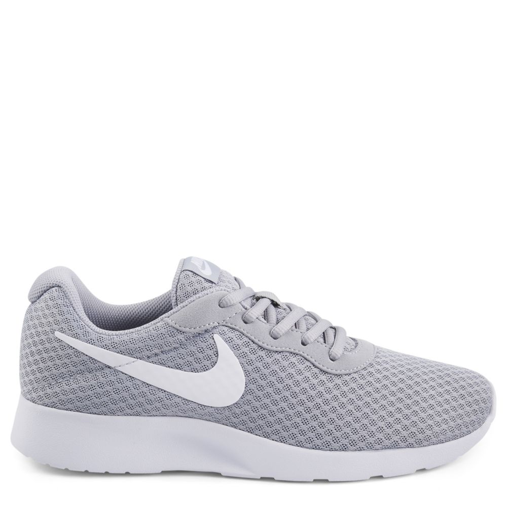 gray nike tennis shoes