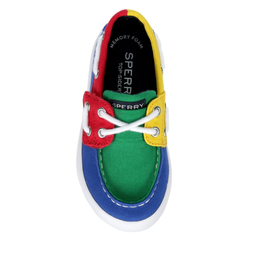 yellow sperry sneakers