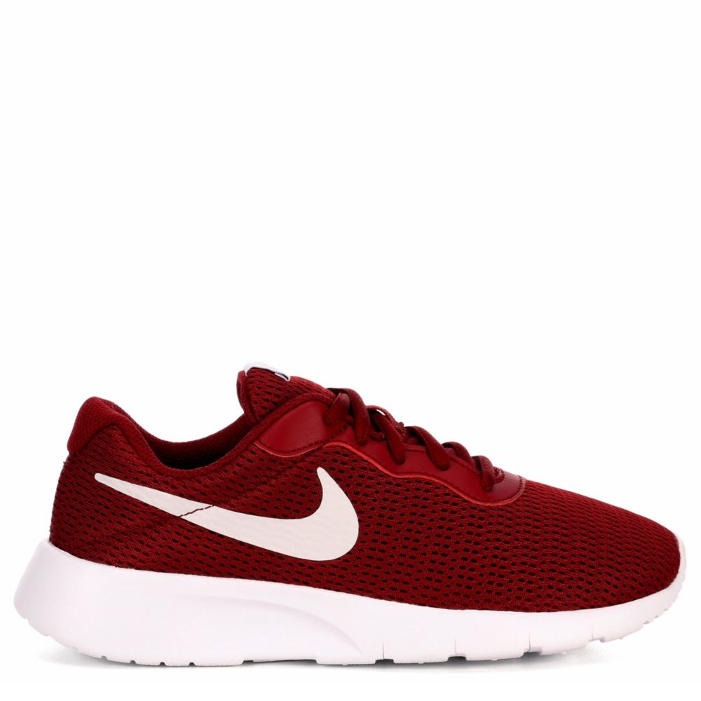 red nike boys trainers