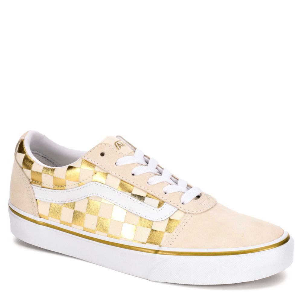 white and gold vans