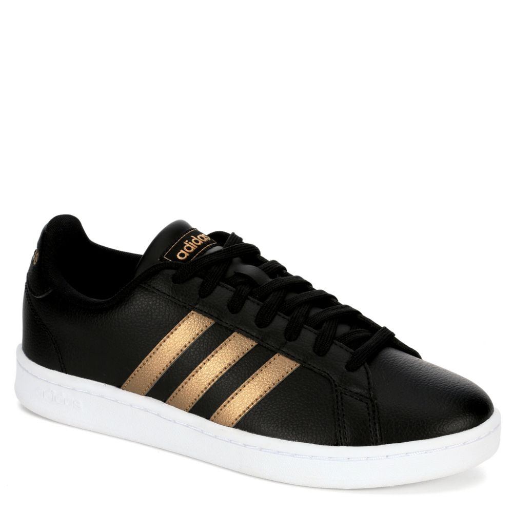 black and gold adidas shoes