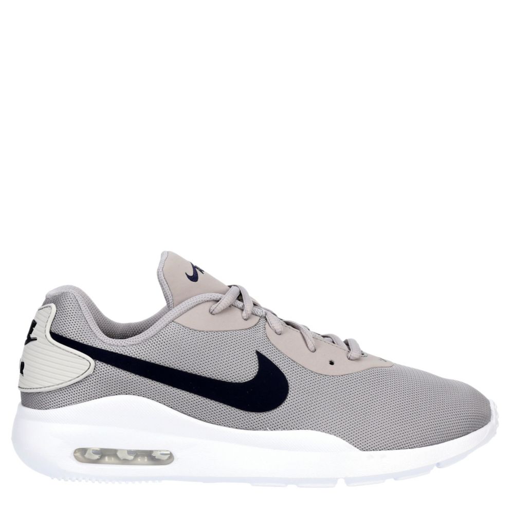gray and black nike shoes
