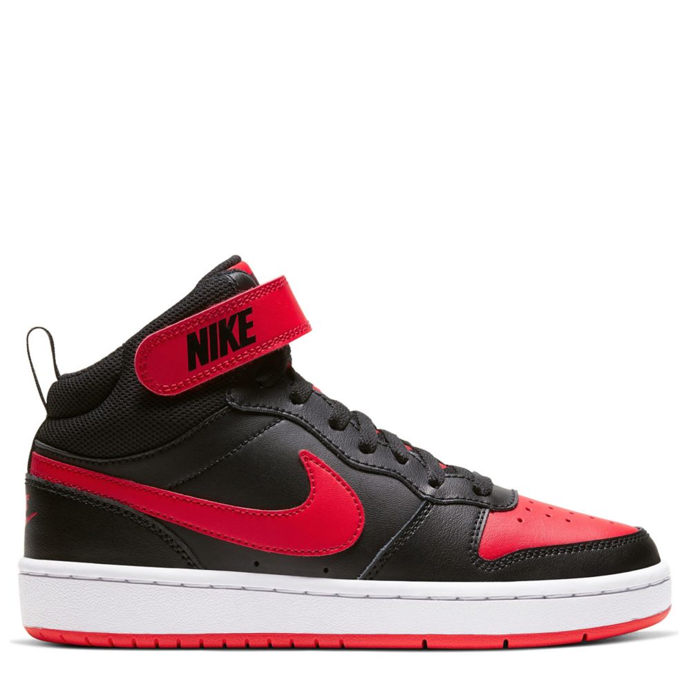 Air Jordan 1 Mid Sneaker School Big Kids' Shoes.