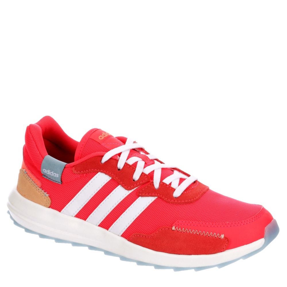 pink and red adidas sneakers